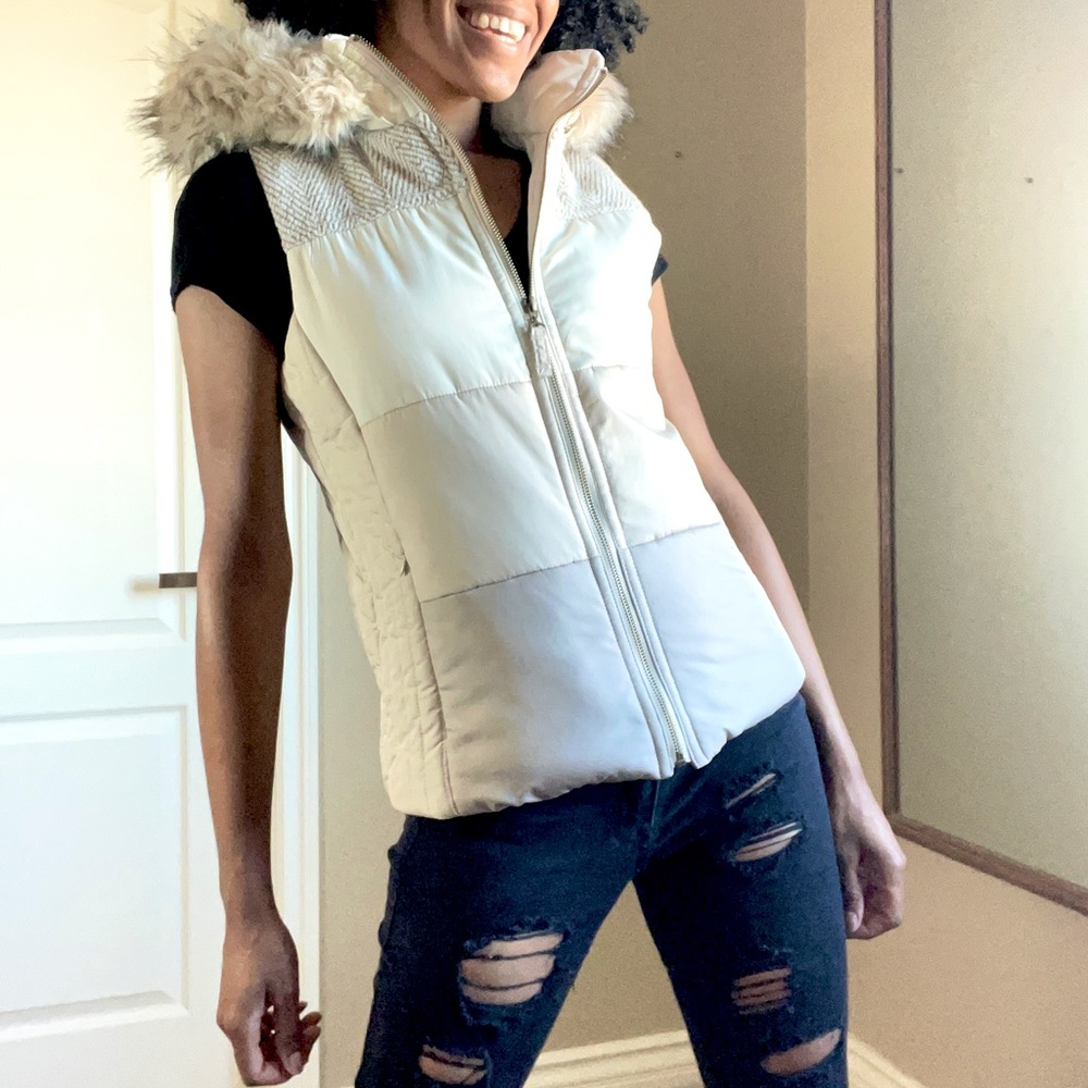 Beige vest with fur hood
